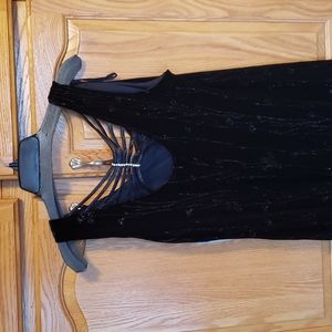 NWT jet black maxi dress. Gorgerous detail on back. Silver flowers & stem